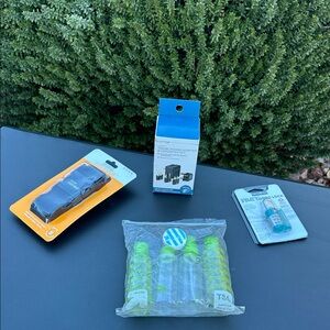 Universal Travel set of Power Adapter, strap, lock & cosmetic travel bottles-new
